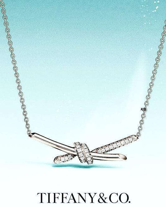 TIFFANY KNOT PENDANT IN SILVER WITH DIAMONDS