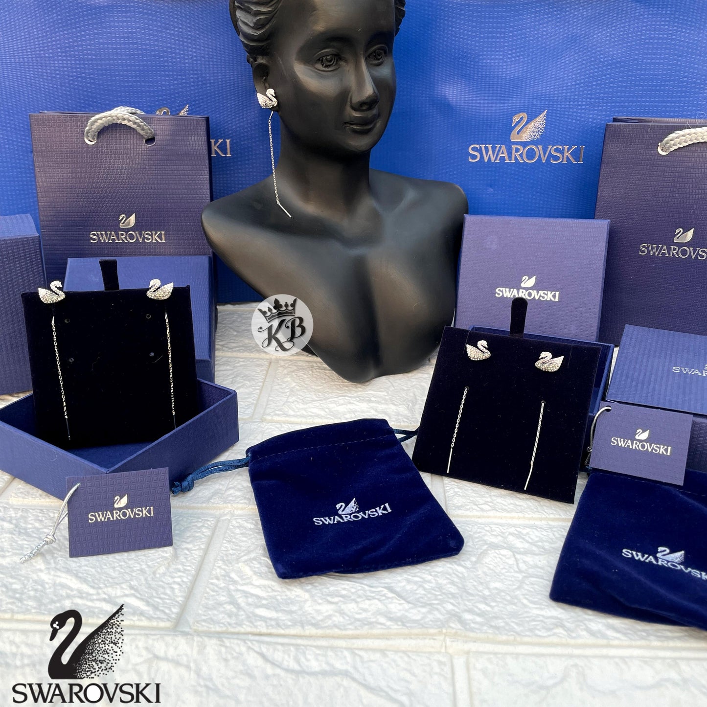 Amazing Swarovski iconic swan drop earrings
