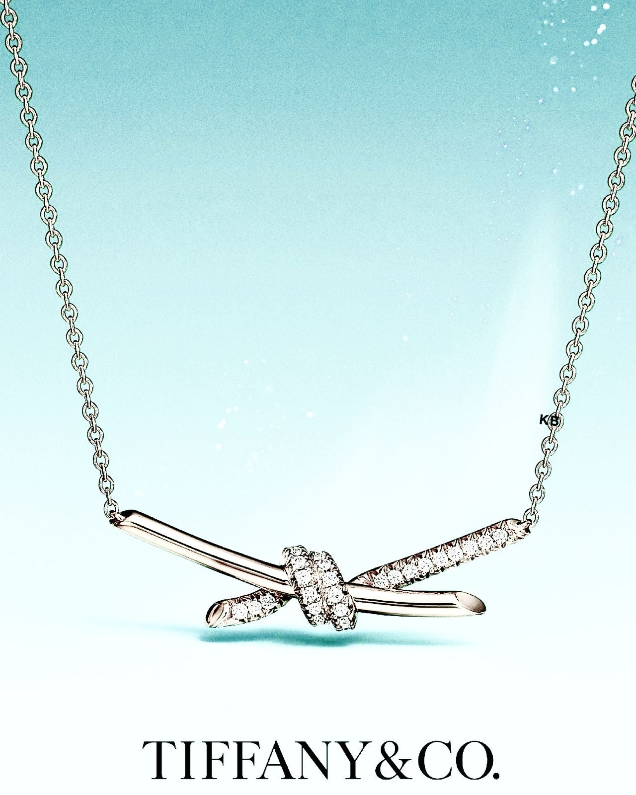 TIFFANY KNOT PENDANT IN SILVER WITH DIAMONDS
